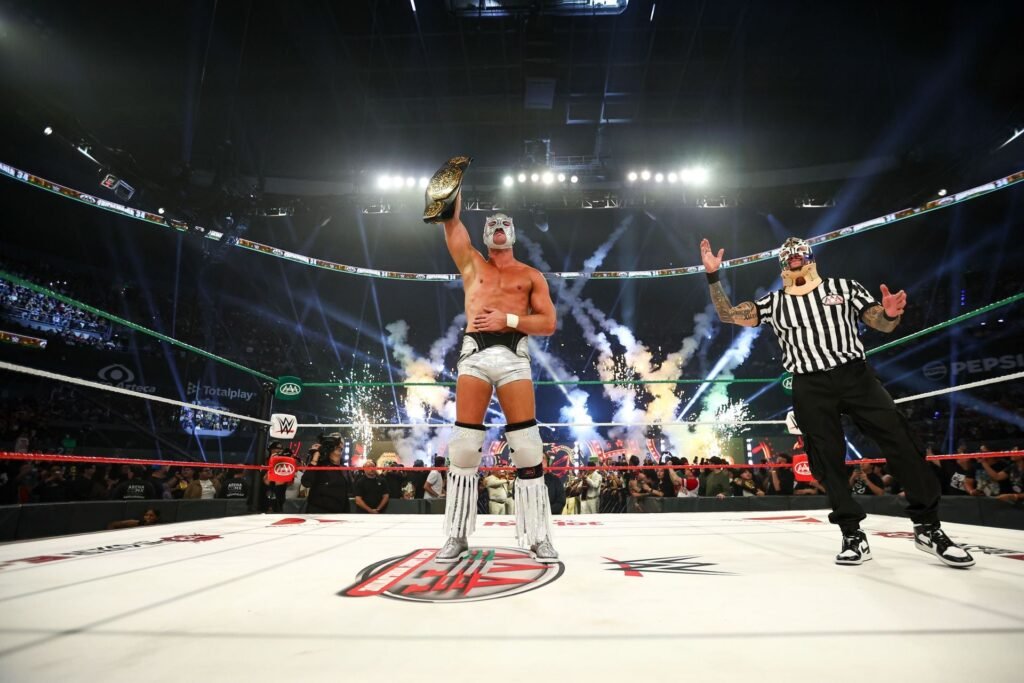 El Grande Americano Kisses 34-Year-Old Female Personality After Winning The AAA Mega Championship