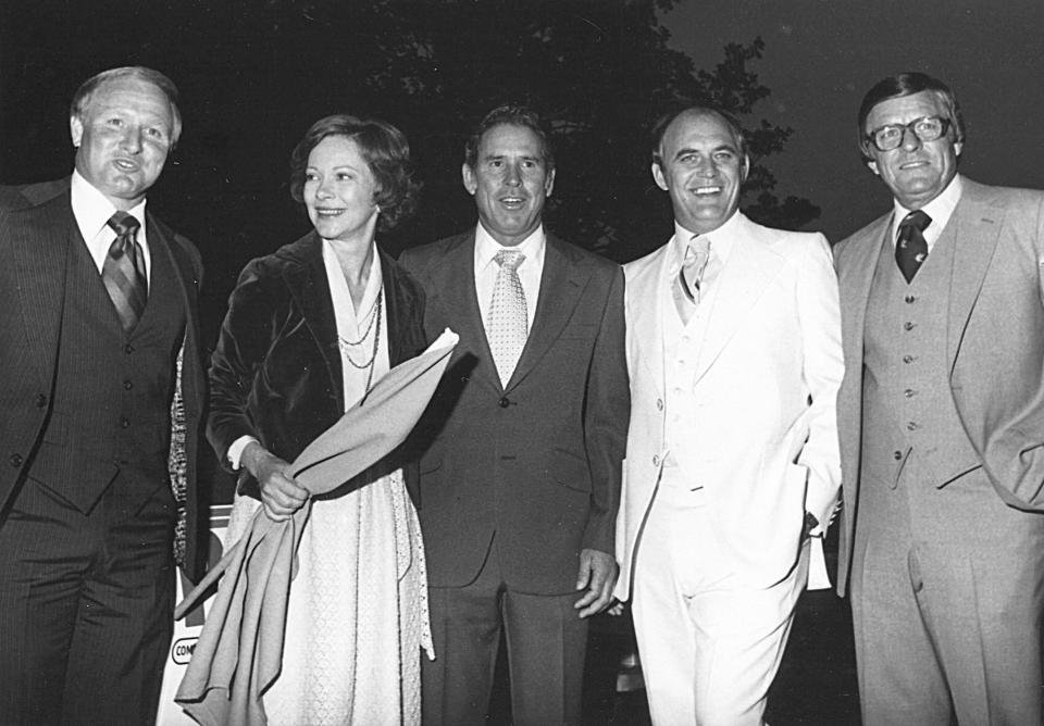 First Lady Rosalyn Carter hosted the 1978 dinner in her husband's absence. Flanking her, from left: NASCAR racers Cale Yarborough, David Pearson, and Benny Parsons, and team owner Bud Moore.