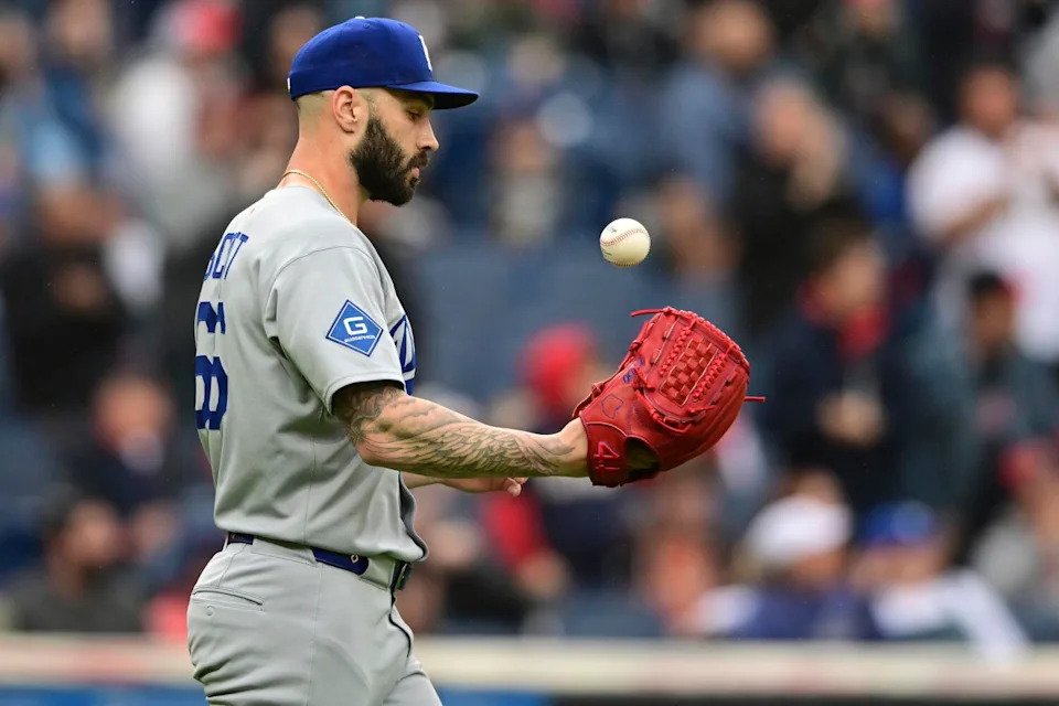 Dodgers relief pitcher Tanner Scott reacts after giving up a two-RBI single to the Guardians' Nolan Jones.
