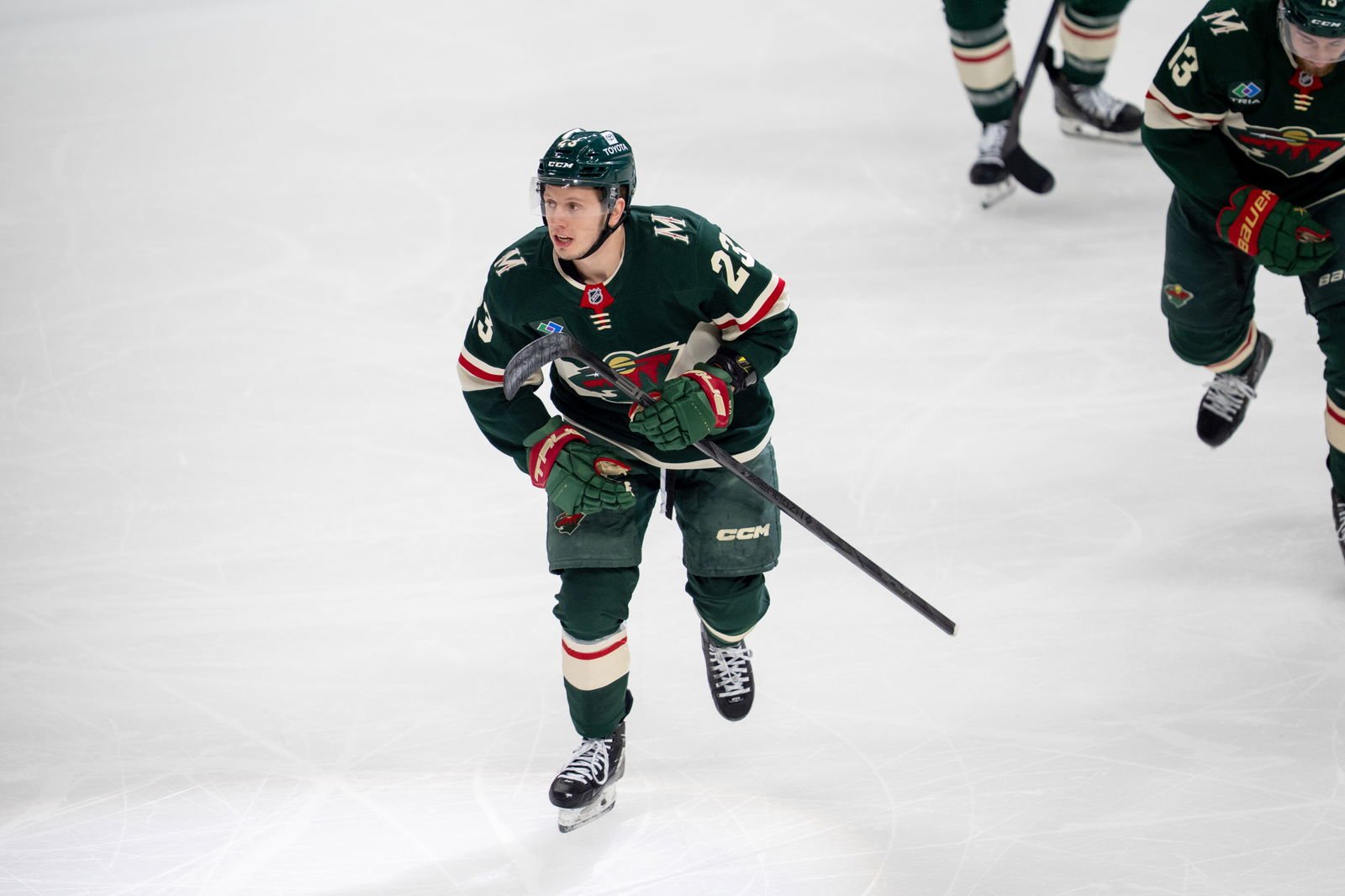 Apr 24, 2025; Saint Paul, Minnesota, USA; Minnesota Wild center Marco Rossi (23) leads the team to the bench after scoring against the Vegas Golden Knights in the first period in game three of the first round of the 2025 Stanley Cup Playoffs at Xcel Energy Center. Mandatory Credit: Matt Blewett-Imagn Images