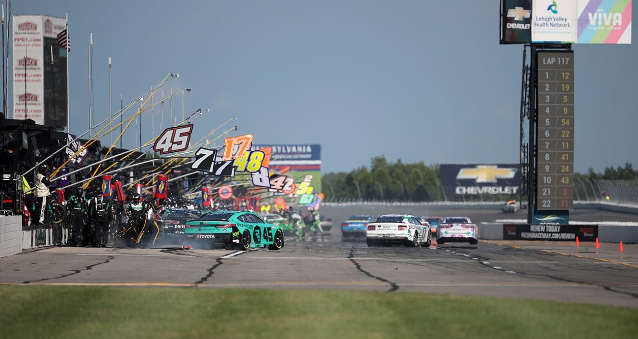 LONG POND, PENNSYLVANIA - JULY 14: A general view of pit road during the NASCAR Cup Series The Great American Getaway 400 Presented by VISITPA.com at Pocono Raceway on July 14, 2024 in Long Pond, Pennsylvania. (Photo by James Gilbert/Getty Images)