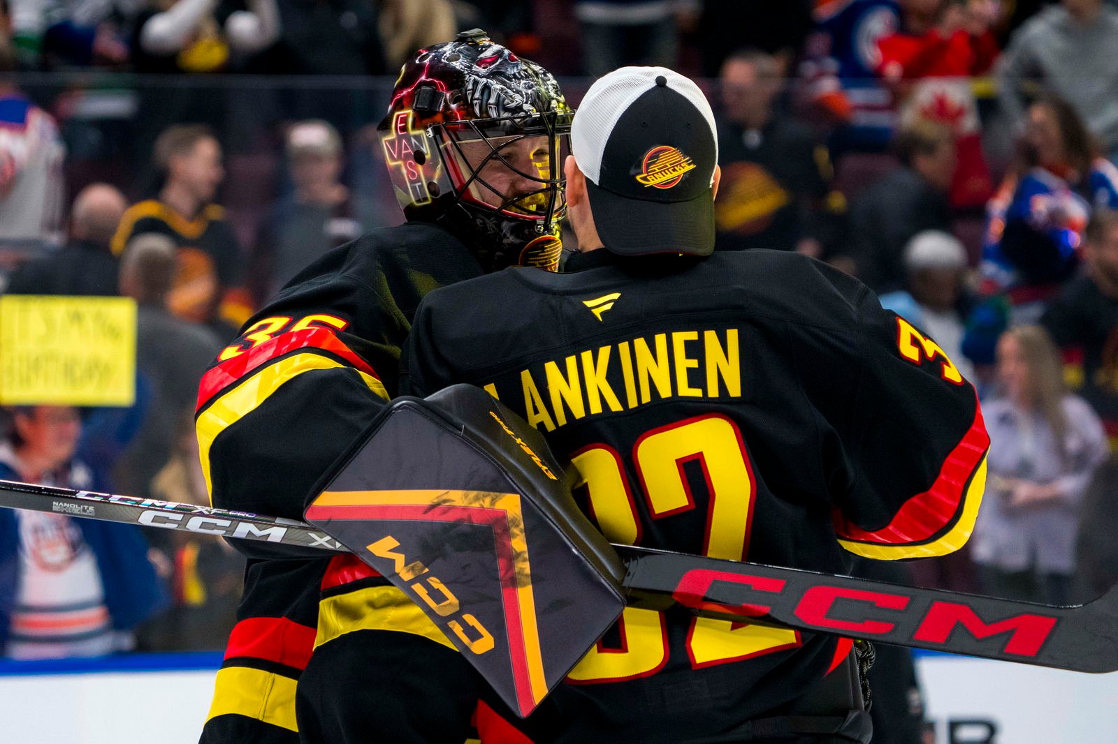 Jan 18, 2025; Vancouver, British Columbia, CAN; Vancouver Canucks goalie Thatcher Demko (35) and goalie Kevin Lankinen (32) celebrate thier victory against the Edmonton Oilers at Rogers Arena. Mandatory Credit: Bob Frid-Imagn Images