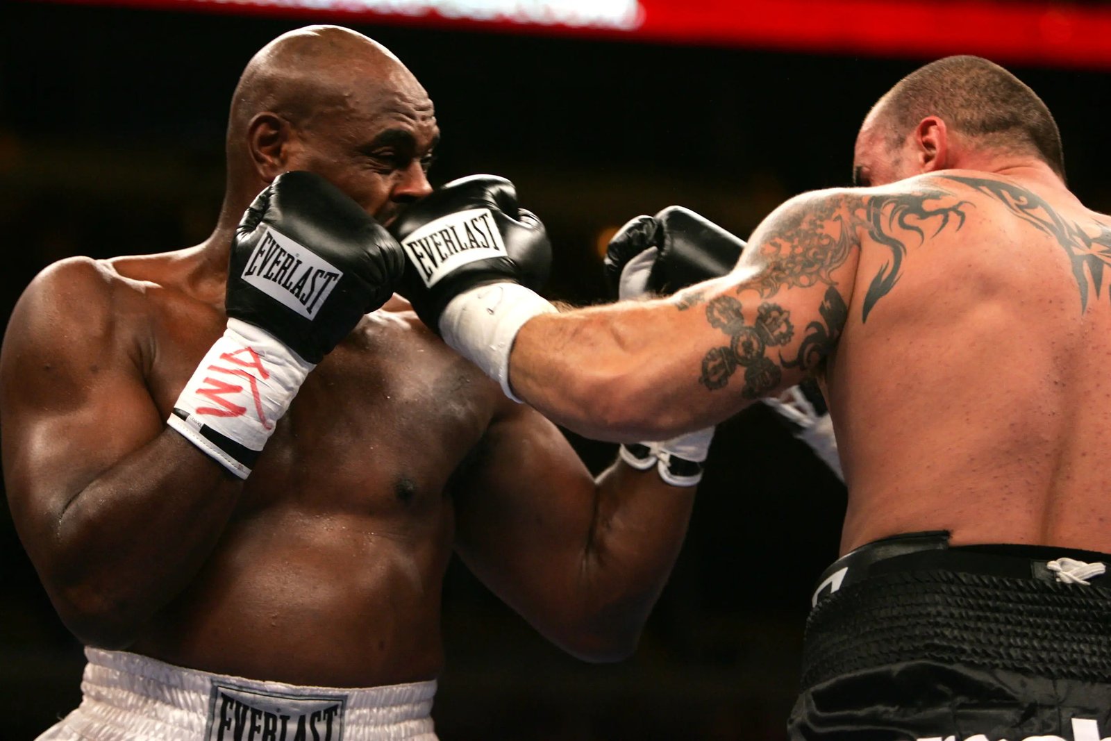 CHICAGO - AUGUST 13: Przemyslaw Saleta lands a punch against Oliver McCall in the Special Heavyweight attraction on August 13, 2005 at the United Center in Chicago, Illinois. (Photo by Jonathan Daniel/Getty Images)
