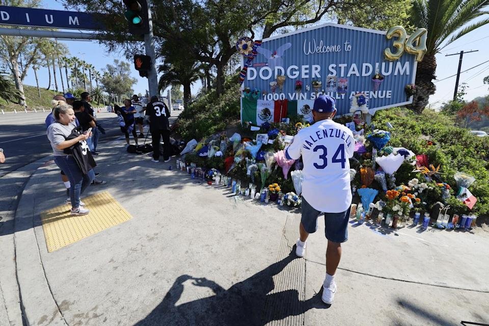 Dodgers fans honor Fernando Valenzuela at a memorial outside Dodger Stadium on Oct. 24, 2024.