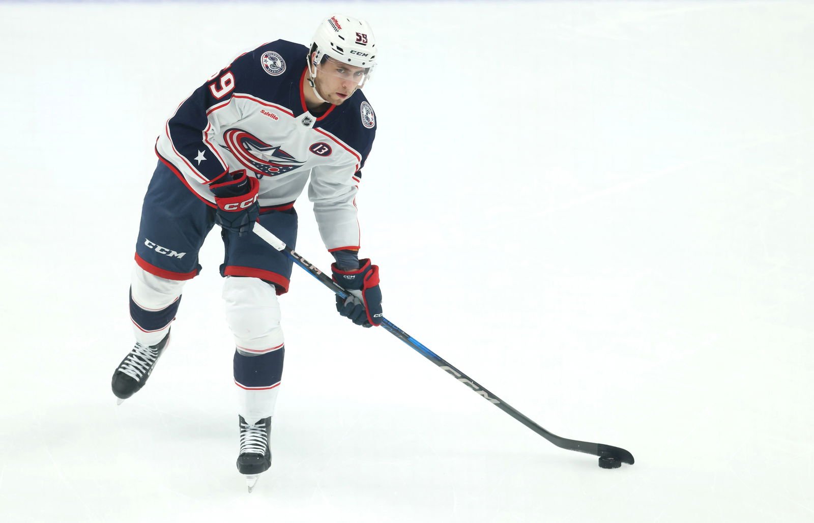 Mar 21, 2025; Pittsburgh, Pennsylvania, USA; Columbus Blue Jackets right wing Yegor Chinakhov (59) warms up before the game against the Pittsburgh Penguins at PPG Paints Arena. Mandatory Credit: Charles LeClaire-Imagn Images