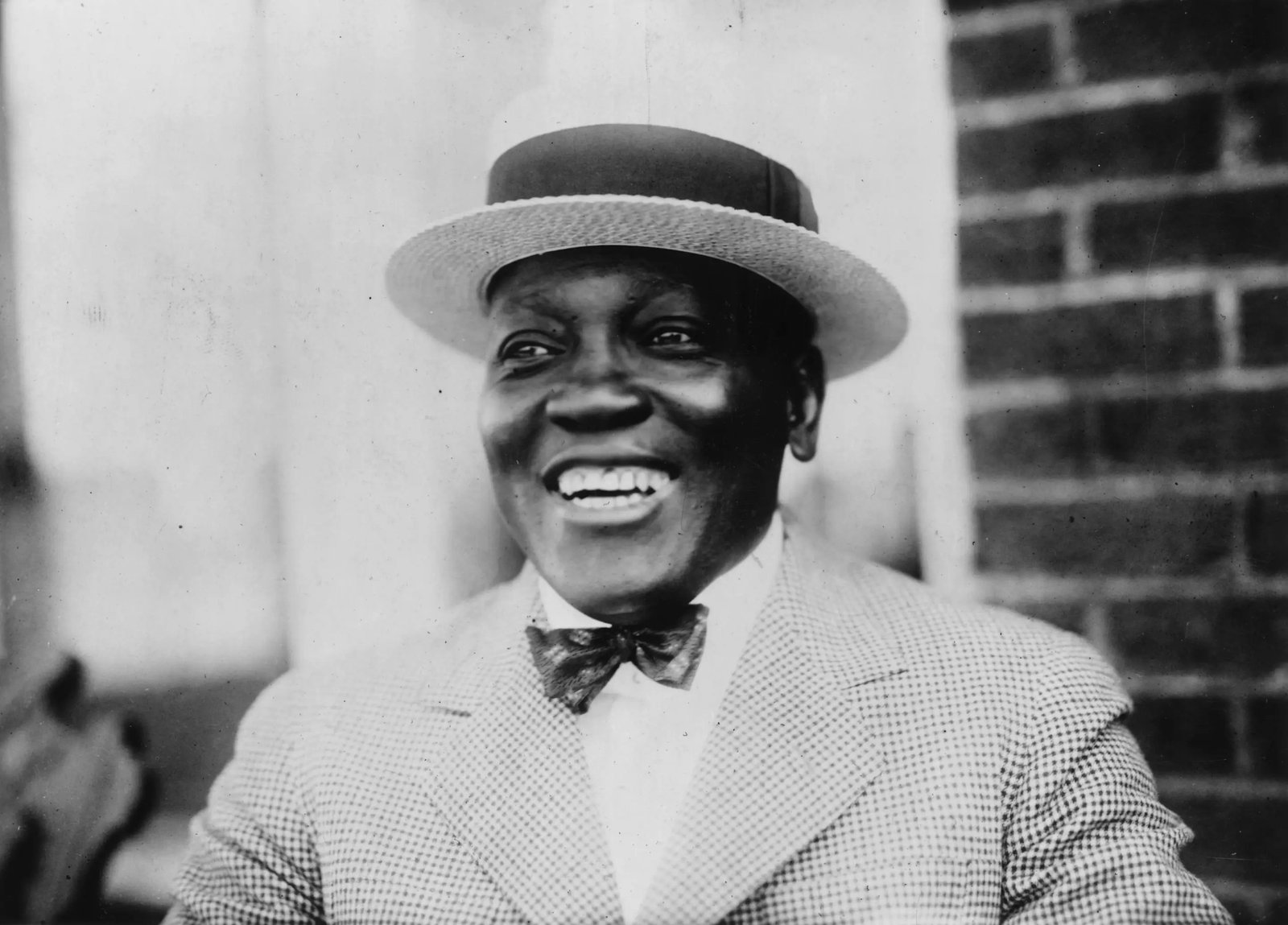 circa 1910: African-American boxer, Jack Johnson (1878 - 1946), he became World Heavyweight Champion in 1908 and defeated a series of 'great white hopes' who challenged him.   (Photo by MPI/Getty Images)
