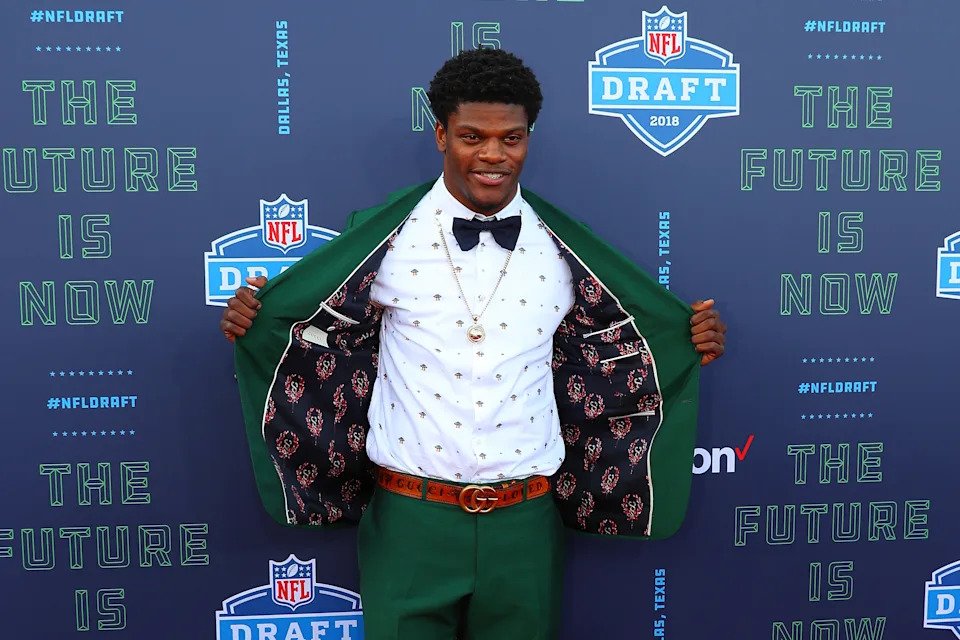 Lamar Jackson's draft fall ended when the Ravens traded back into the first round to take him. (Photo by Rich Graessle/Icon Sportswire via Getty Images)