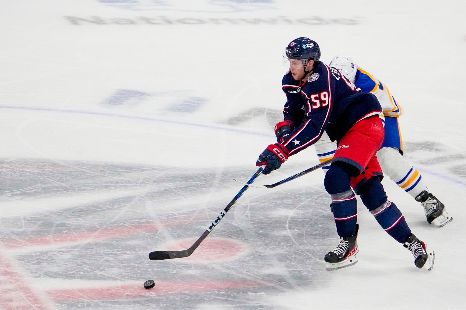 Oct 17, 2024; Columbus, Ohio, USA; Columbus Blue Jackets right wing Yegor Chinakhov (59) skates with the puck against the Buffalo Sabres in the second period at Nationwide Arena on Thursday. Mandatory Credit: Samantha Madar/USA TODAY Network via Imagn Images