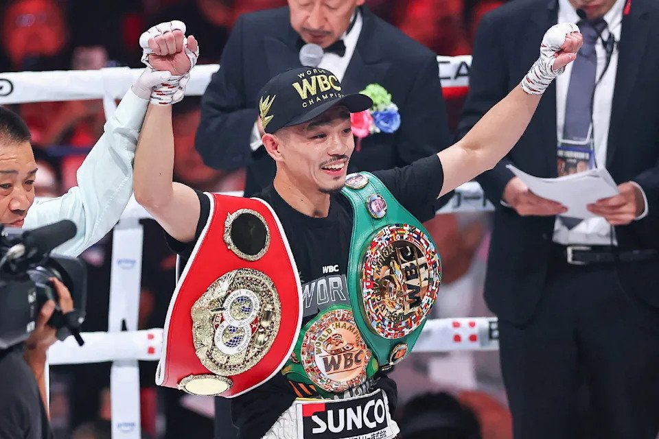 Japan's Junto Nakatani celebrates his victory over Japan's Ryosuke Nishida at the end of their WBC and IBF bantamweight boxing title fight at the Ariake Coliseum in Tokyo on June 8, 2025. (Photo by JIJI Press / AFP) / Japan OUT (Photo by STR/JIJI Press/AFP via Getty Images)