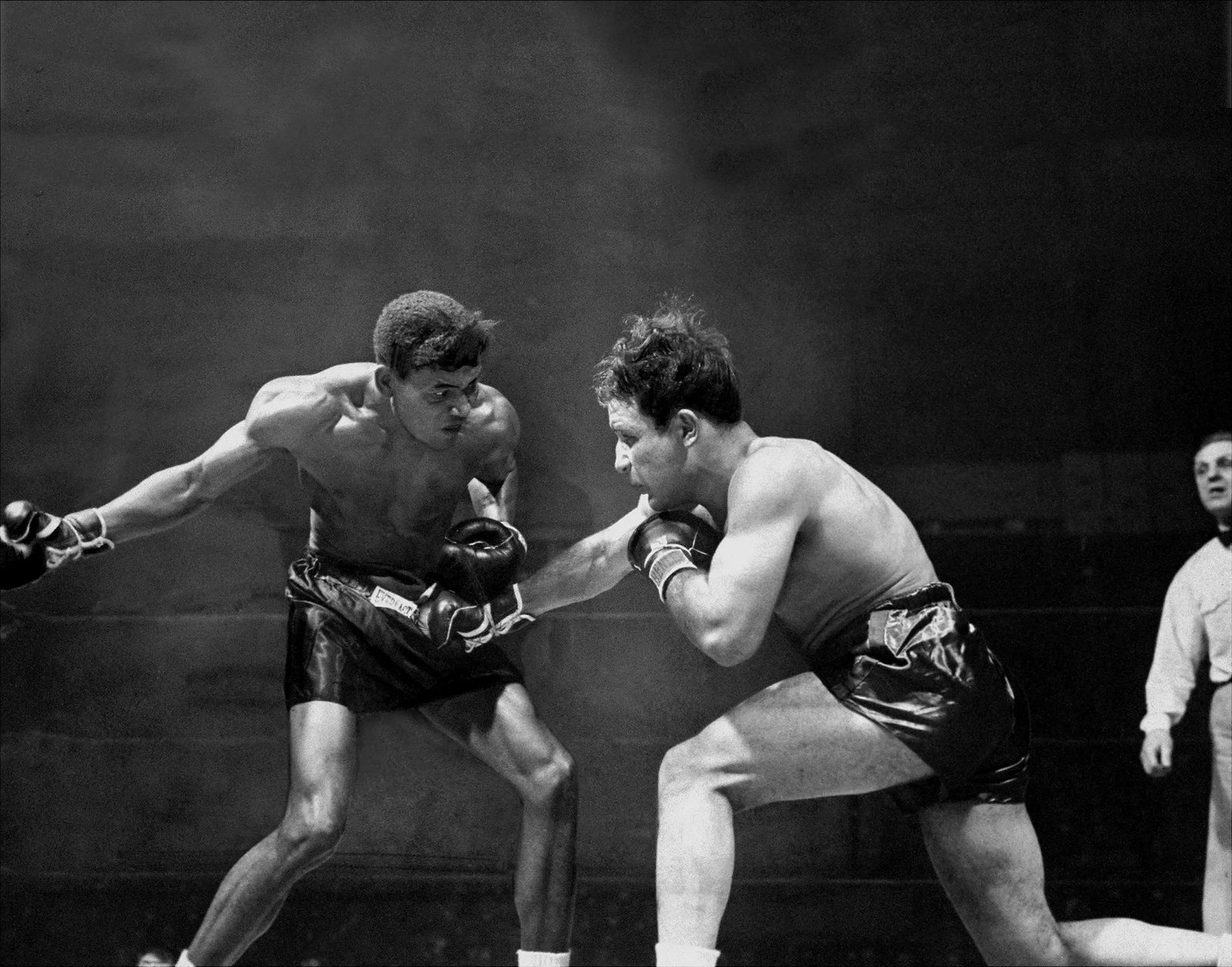 UNITED STATES - FEBRUARY 24:  In second round at the Garden, Sugar Ray Robinson winds up with a mighty haymaker to throw at Jake Lamotta. Ray won the ten-rounder unanimously.  (Photo by Hank Olen/NY Daily News Archive via Getty Images)
