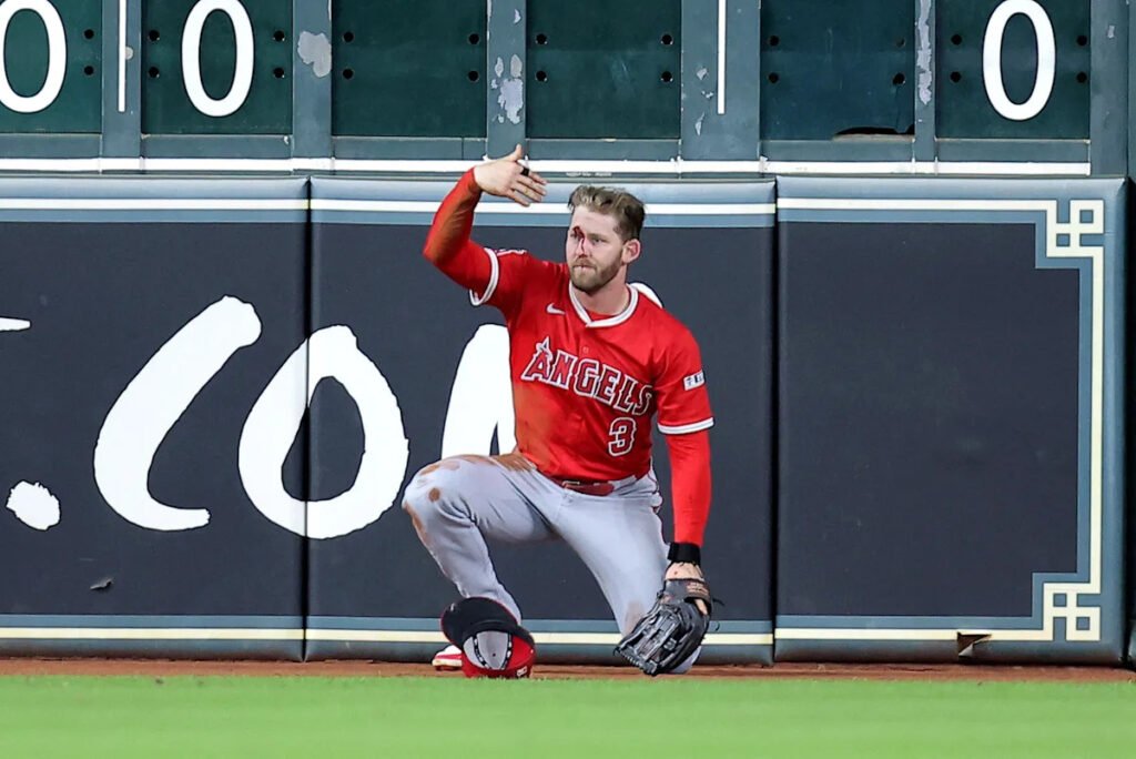Angels outfielder Taylor Ward carted off after crashing head-first into metal scoreboard in win over Astros