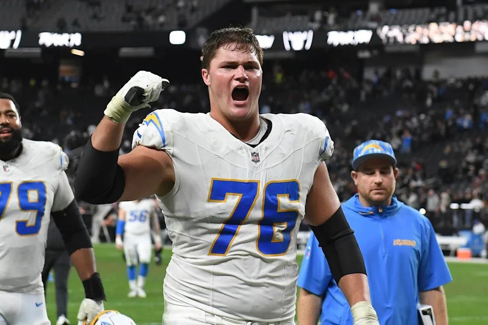 Chargers offensive lineman Joe Alt celebrates after a win over the Las Vegas Raiders in January.