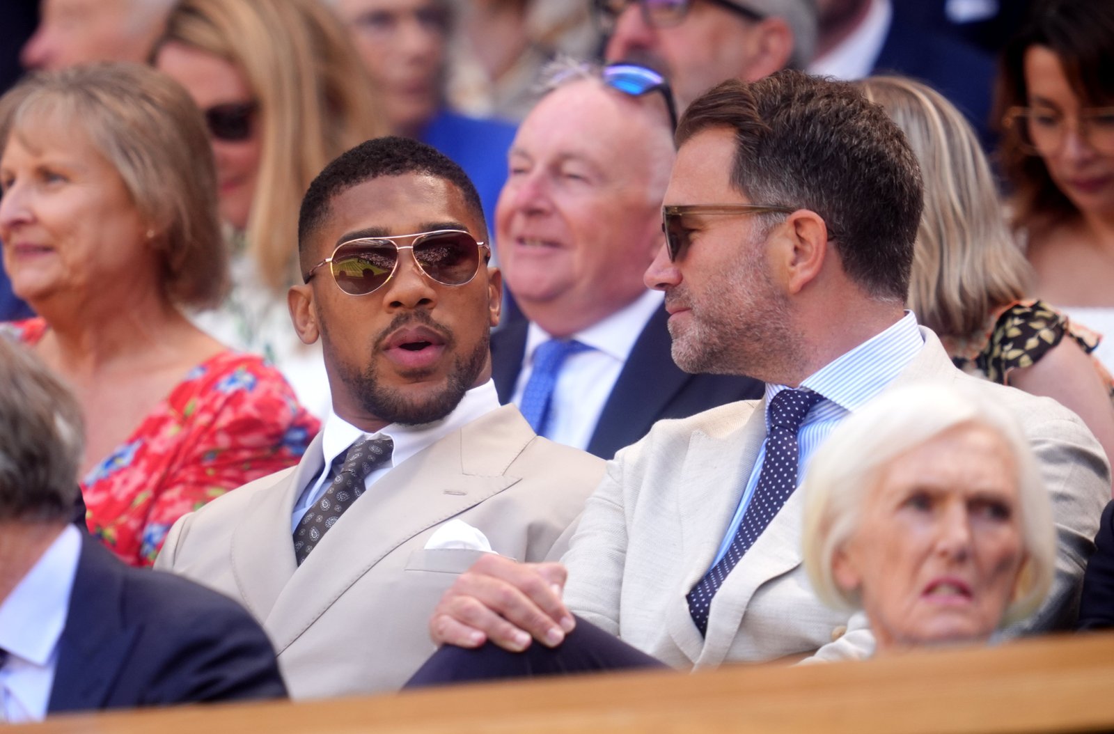 Eddie Hearn (right) with Anthony Joshua at Wimbledon this summer