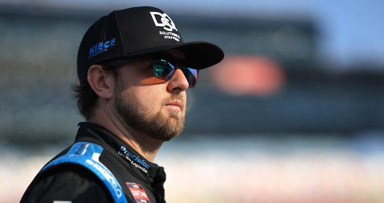 Kaden Honeycutt looks on before a NASCAR Craftsman Truck Series race.