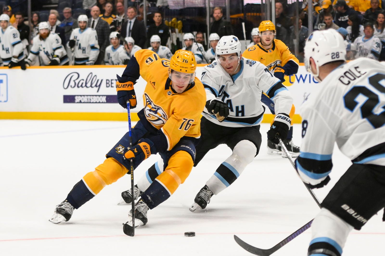 Apr 14, 2025; Nashville, Tennessee, USA; Nashville Predators defenseman Brady Skjei (76) skates with the puck against the Utah Hockey Club during the third period at Bridgestone Arena. Mandatory Credit: Steve Roberts-Imagn Images