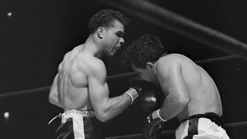 (Original Caption) Billy Fox, (L), lands a right uppercut on Jake LaMotta during their scheduled 10 round bout at Madison Square Garden. Fox, the Philadelphia battler who is gunning for another shot at the light heavyweight championship, handed the Bronx fighter the first knockout in his career, winning in the fourth round when the referee stopped what had become a slaughter.