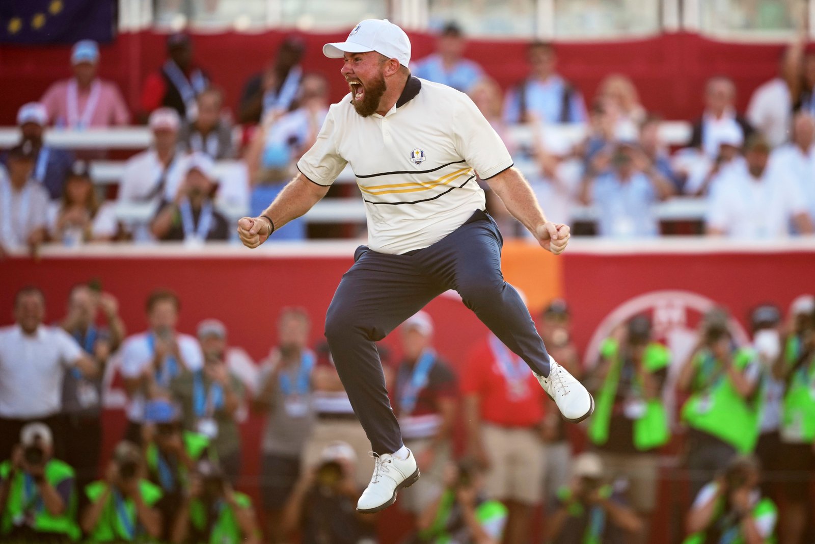 Shane Lowry jumps for joy after sealing the Ryder Cup