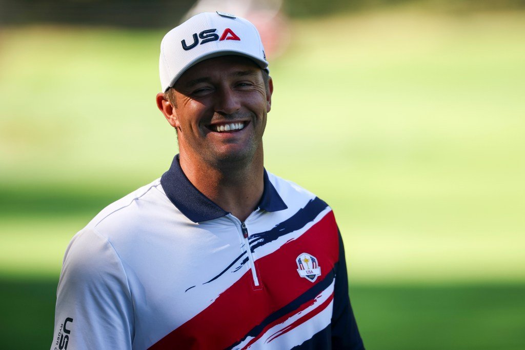 Bryson DeChambeau smiles during a practice round for the Ryder Cup 2025.
