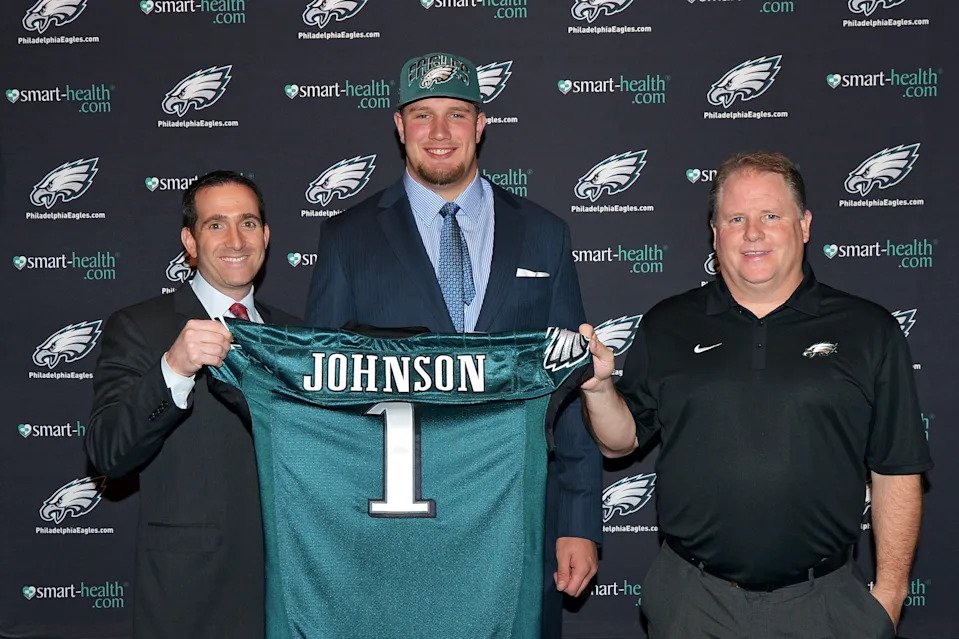 Howie Roseman, pictured in 2013 with Eagles head coach Chip Kelly and first-round draft pick Lane Johnson. (Photo by Drew Hallowell/Philadelphia Eagles/Getty Images)