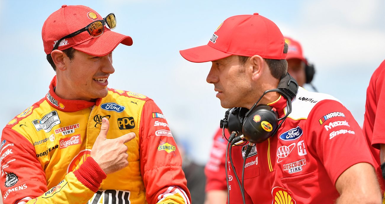 joey logano talks to crew chief paul wolfe