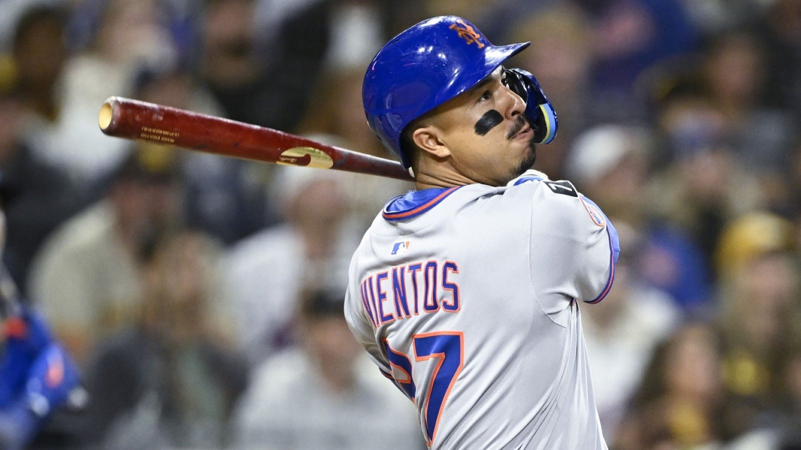 Jul 28, 2025; San Diego, California, USA; New York Mets third baseman Mark Vientos (27) hits a grand slam during the fifth inning against the San Diego Padres at Petco Park. 
