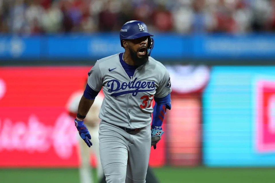 Teoscar Hernández celebrates after hitting a three-run home run against the Phillies.