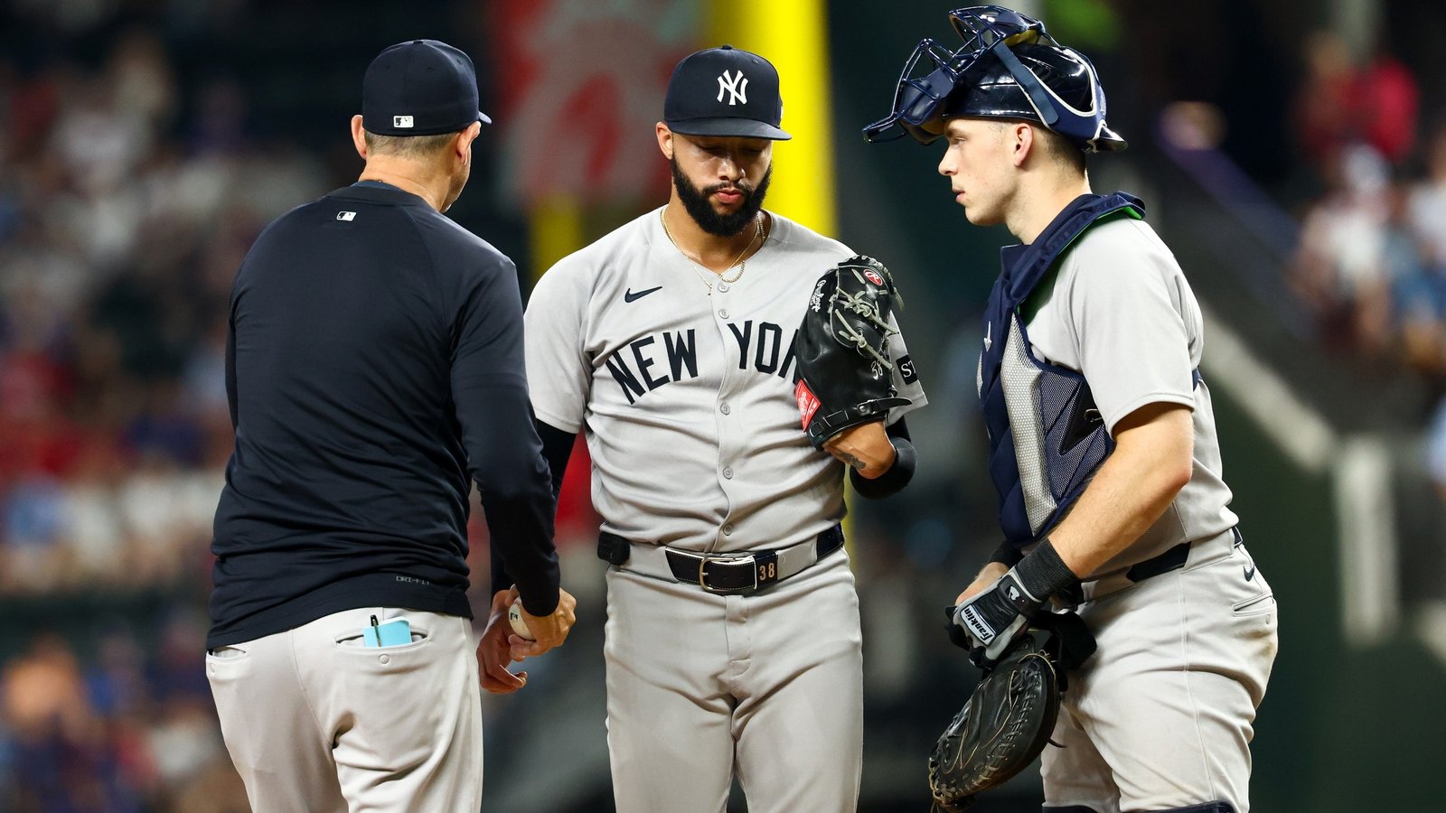 Aug 5, 2025; Arlington, Texas, USA; New York Yankees relief pitcher Devin Williams (38) reacts after leaving the game during the eighth inning against the Texas Rangers at Globe Life Field.