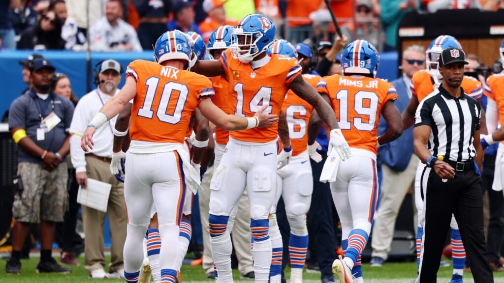 Broncos lead Cowboys 27-10 at halftime