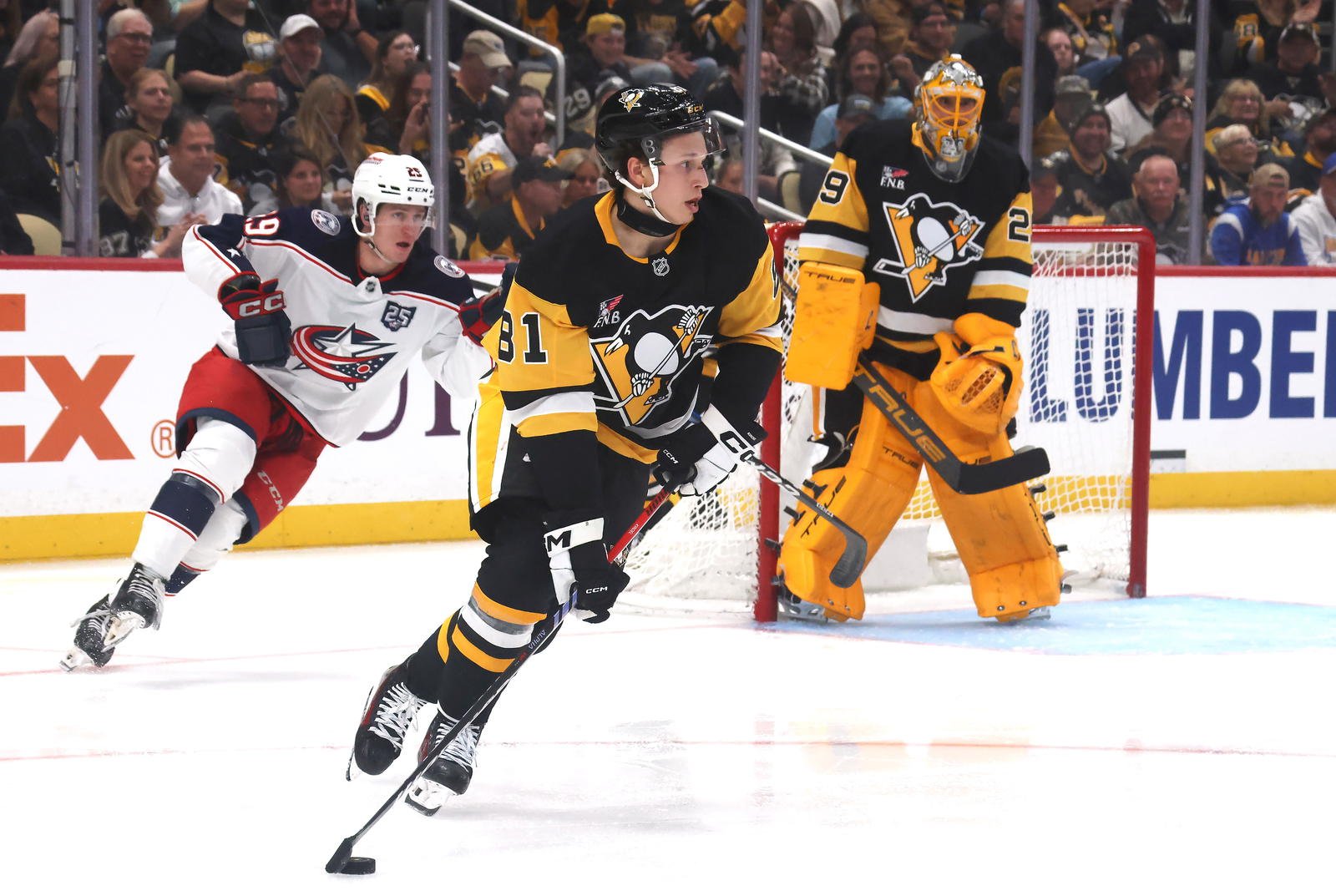 Sep 27, 2025; Pittsburgh, Pennsylvania, USA; Pittsburgh Penguins center Ben Kindel (81) moves the puck against the Columbus Blue Jackets during the third period at PPG Paints Arena. Mandatory Credit: Charles LeClaire-Imagn Images
