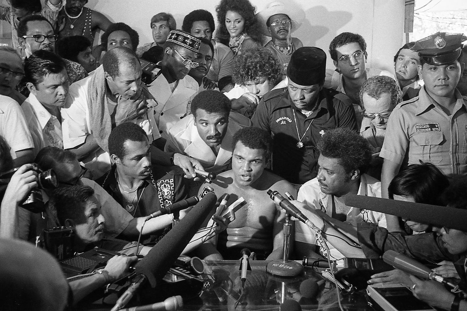 MANILA - SEPTEMBER 1975: World Heavyweight boxing champion Muhammad Ali speaks to the international press during break in training in gym days before his heavyweight bout against Joe Frazier in September 1975 (photo by nik wheeler/Corbis via Getty Images)
