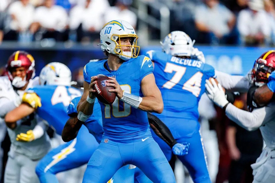 Chargers quarterback Justin Herbert looks to throw during a loss to the Washington Commanders on Oct. 5.