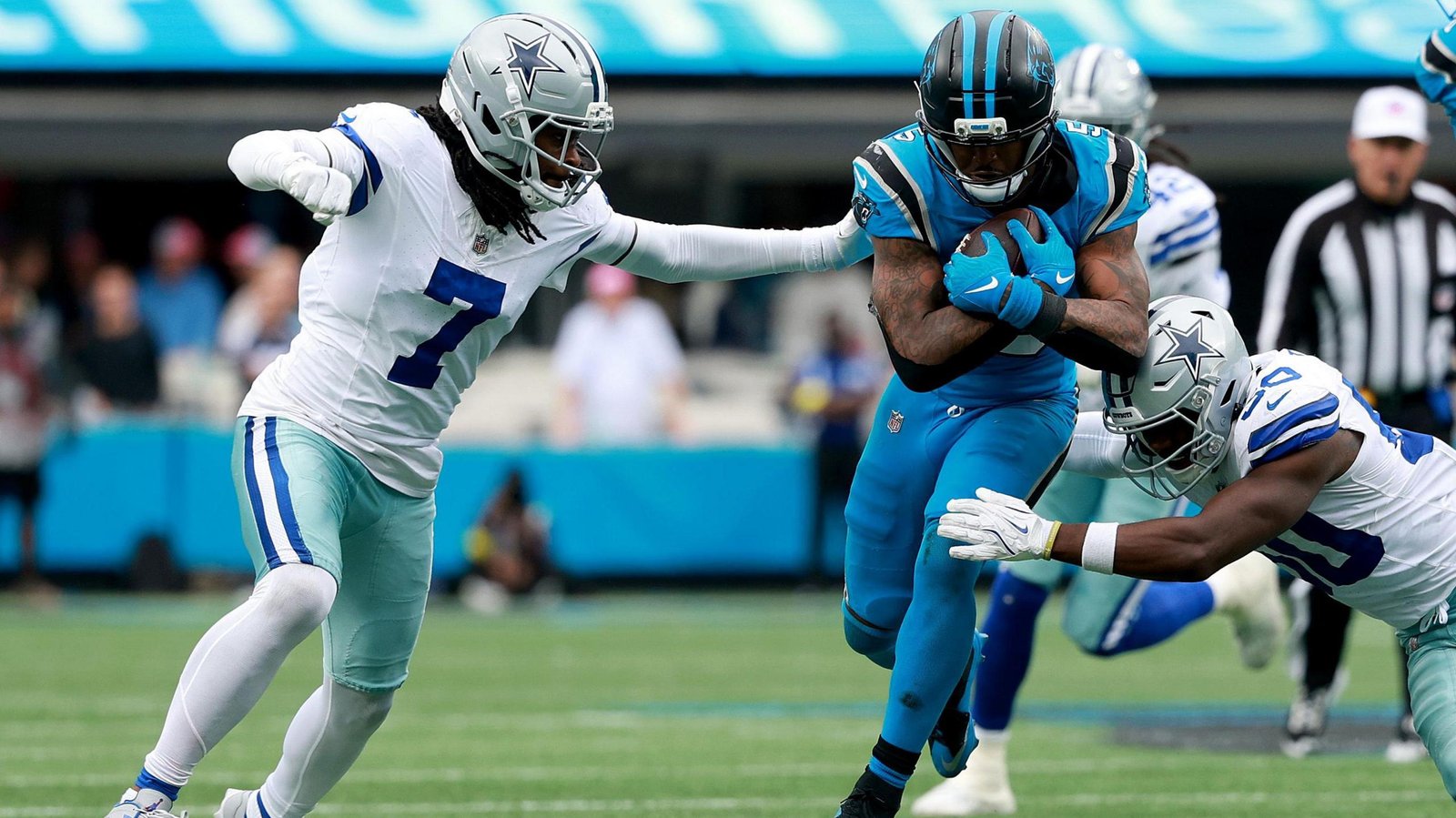 Rico Dowdle runs with the ball for the Carolina Panthers in their victory over the Dallas Cowboys in the NFL on Sunday