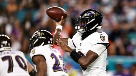 Lamar Jackson’s third TD pass gives Ravens a 21-6 lead