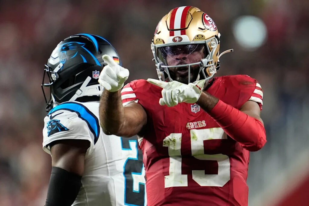 49ers WR Jauan Jennings smacks Panthers safety Tre’von Moehrig postgame