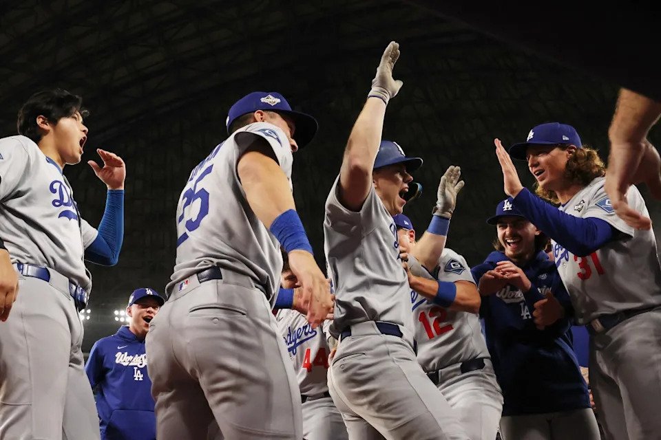 Los Angeles Dodgers catcher Will Smith (16) is is congratulated after he hit a solo home run.