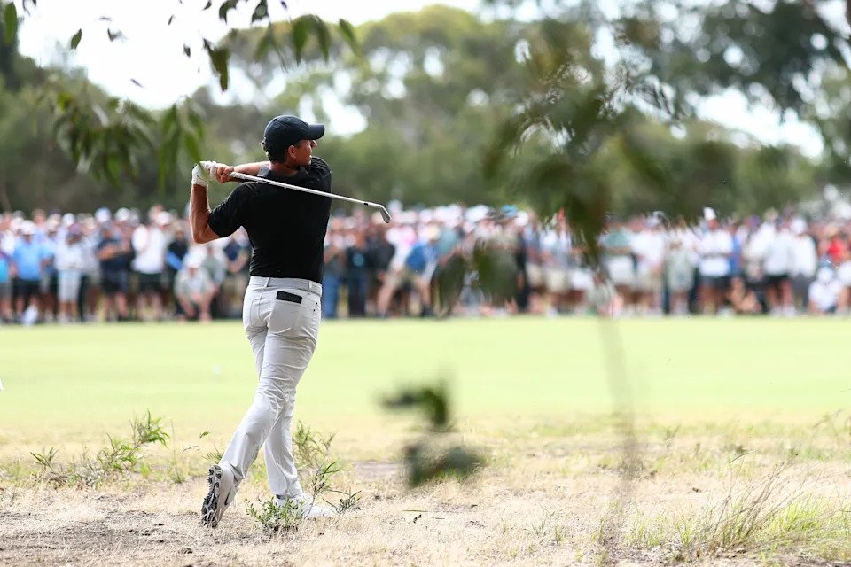 MELBOURNE, AUSTRALIA - DECEMBER 05: Rory McIlroy of Northern Ireland plays a shot on the 17th hole on day two of the Crown Australian Open 2025 at The Royal Melbourne Golf Club on December 05, 2025 in Melbourne, Australia. (Photo by Josh Chadwick/Getty Images)