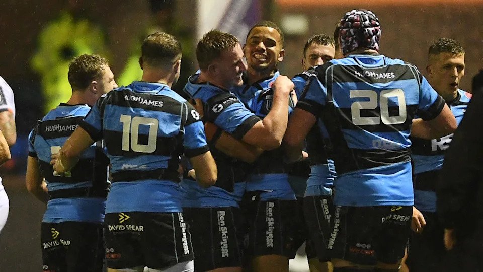 Cardiff celebrate after their URC victory against Edinburgh at the Arms Park