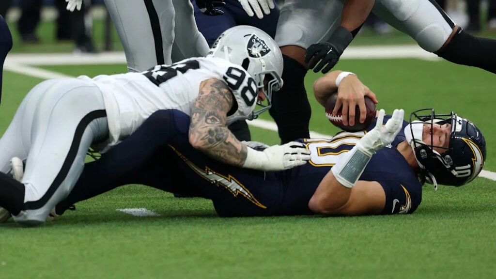 Justin Herbert says he’s preparing to play Monday night, one week after left hand surgery