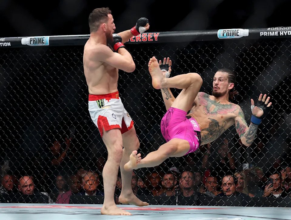 NEWARK, NEW JERSEY - JUNE 07: Merab Dvalishvili of Georgia competes against Sean O'Malley of the United States in the bantamweight title bout during UFC 316 at the Prudential Center on June 07, 2025 in Newark, New Jersey. (Photo by Elsa/Getty Images)