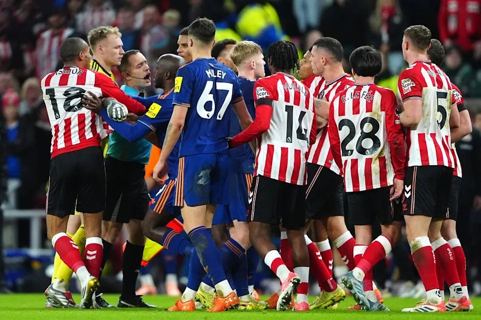 Tensions boiled over as the rivalry became heated in the closing minutes (Owen Humphreys/PA Wire)