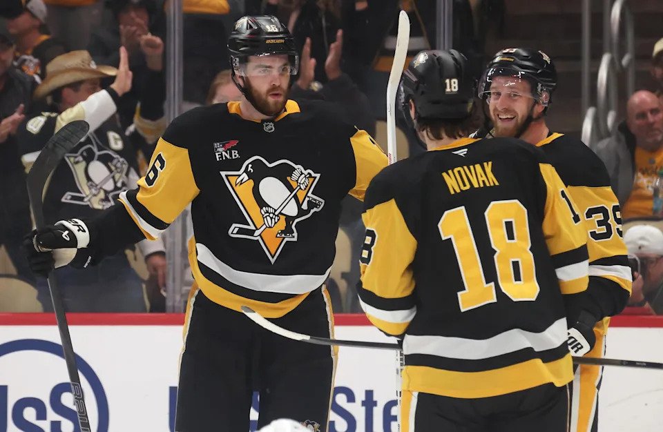 Oct 21, 2025; Pittsburgh, Pennsylvania, USA; Pittsburgh Penguins right wing Justin Brazeau (16) celebrates his goal with center Tommy Novak (18) and right wing Anthony Mantha (39) against the Vancouver Canucks during the third period at PPG Paints Arena. Mandatory Credit: Charles LeClaire-Imagn Images
