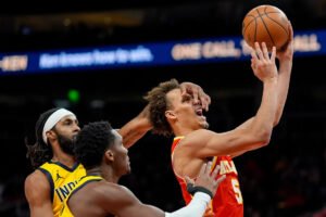 CJ McCollum scores 23 points and Hawks ride 17-0 second-half run to charge past Pacers 132-116