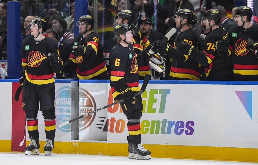 Canucks rally to end 11-game losing streak with 4-3 win over Capitals