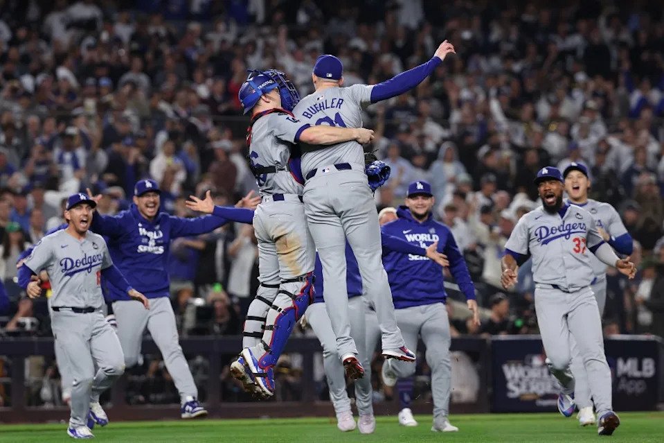 The Dodgers celebrate as they defeat the New York Yankees 7-6 to win Game Five and the 2024 World Series. Getty Images