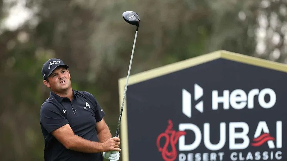 Patrick Reed hits a tee shot at the Hero Dubai Desert Classic