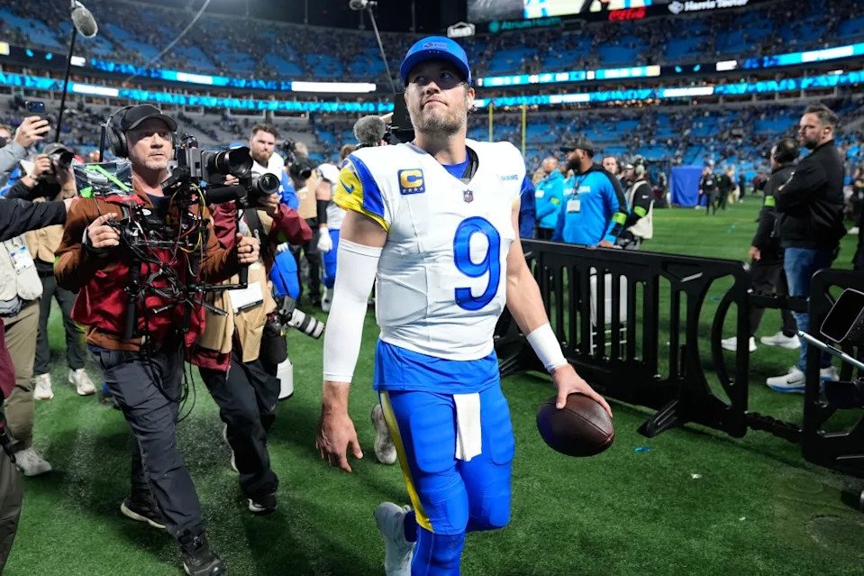Los Angeles Rams quarterback Matthew Stafford (9) walks off the field after a win over the Carolina Panthers in an NFL wild-card playoff football game, Saturday, Jan. 10, 2026, in Charlotte, N.C. AP