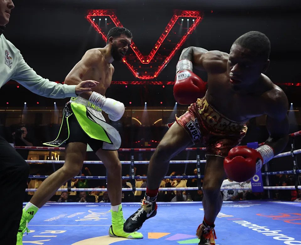 RIYADH, SAUDI ARABIA - JUNE 1: Hamzah Sheeraz ( White shorts ) and Austin Williams ( Red and Gold shorts ) box during their Middleweight Contest on June 1, 2024 in Riyadh, Saudi Arabia. (Photo by Mark Robinson/Matchroom Boxing/Getty Images)