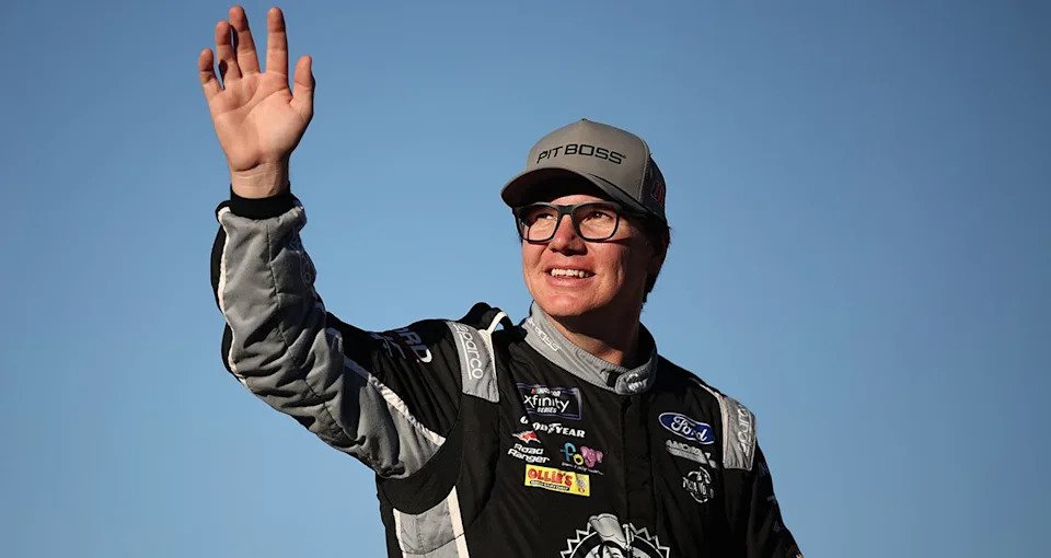 AVONDALE, ARIZONA - NOVEMBER 01: Sheldon Creed, driver of the #00 Pit Boss Ford, waves to fans as he walks onstage during driver intros prior to the NASCAR Xfinity Series Championship at Phoenix Raceway on November 01, 2025 in Avondale, Arizona. (Photo by James Gilbert/Getty Images)