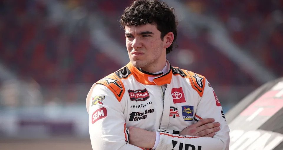 Gio Ruggiero looks on.