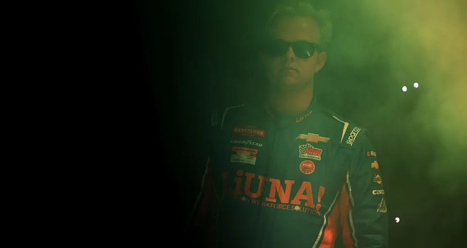 Tyler Ankrum looks on.